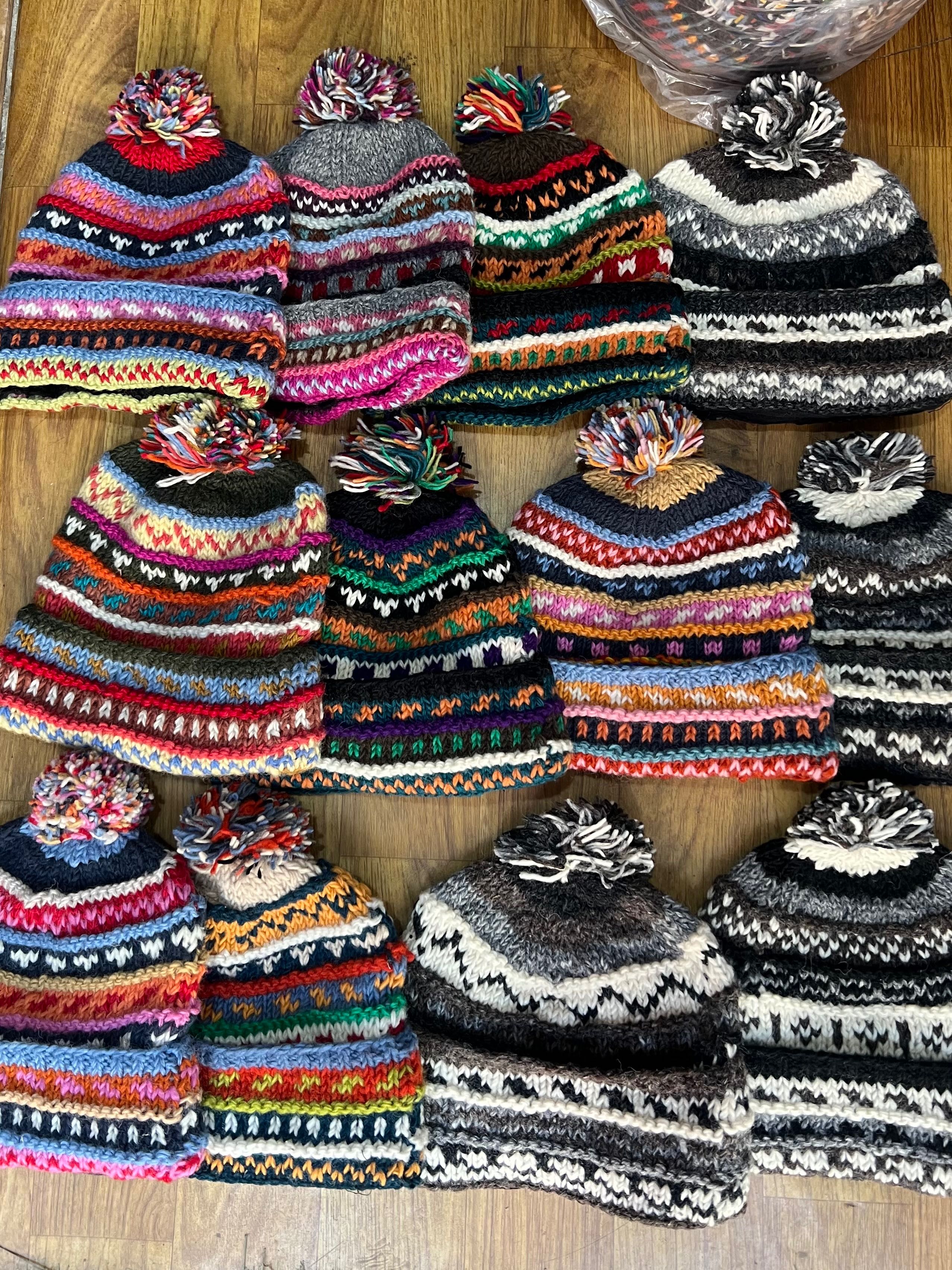 Handwoven woolen beanie made from 100% natural wool. Warm, breathable, and ethically handcrafted by Nepalese artisans. Perfect for winter wear.